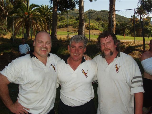 Three Fossils in their dinosaur-crest jerseys